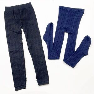 Pair of little girls cable knit black footless and navy blue footed leggings